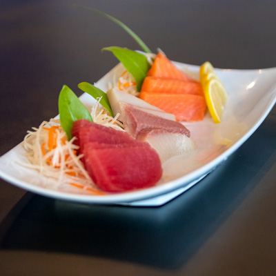 image of a white plate with 3 kinds of sashimi